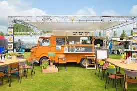 Food truck serving customers at a street festival